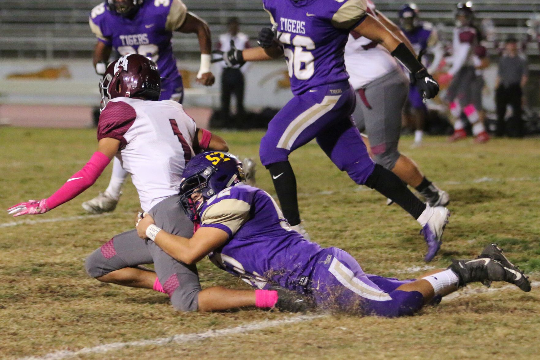 Tigers stay hot with 42-6 rout of Pioneers, clinch playoff spot